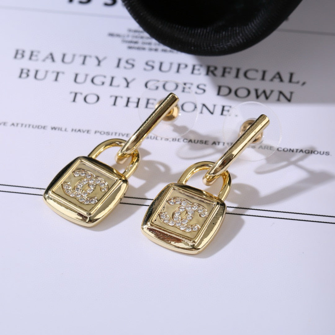 Chanel Lock Shaped Gold Diamond Earring