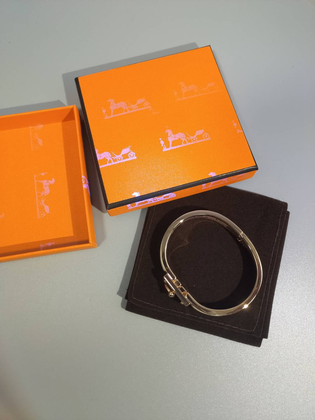 HERMES H ORANGE BRACELET