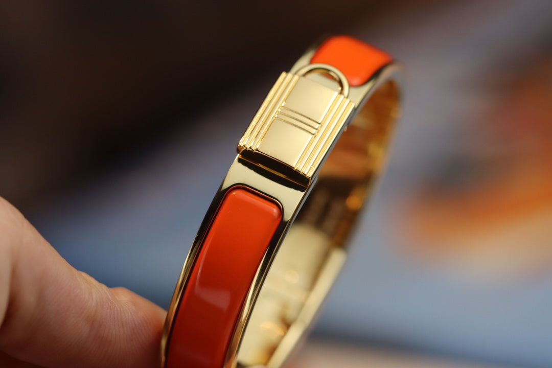 HERMES H LOCK ORANGE GOLD BRACELET 12MM