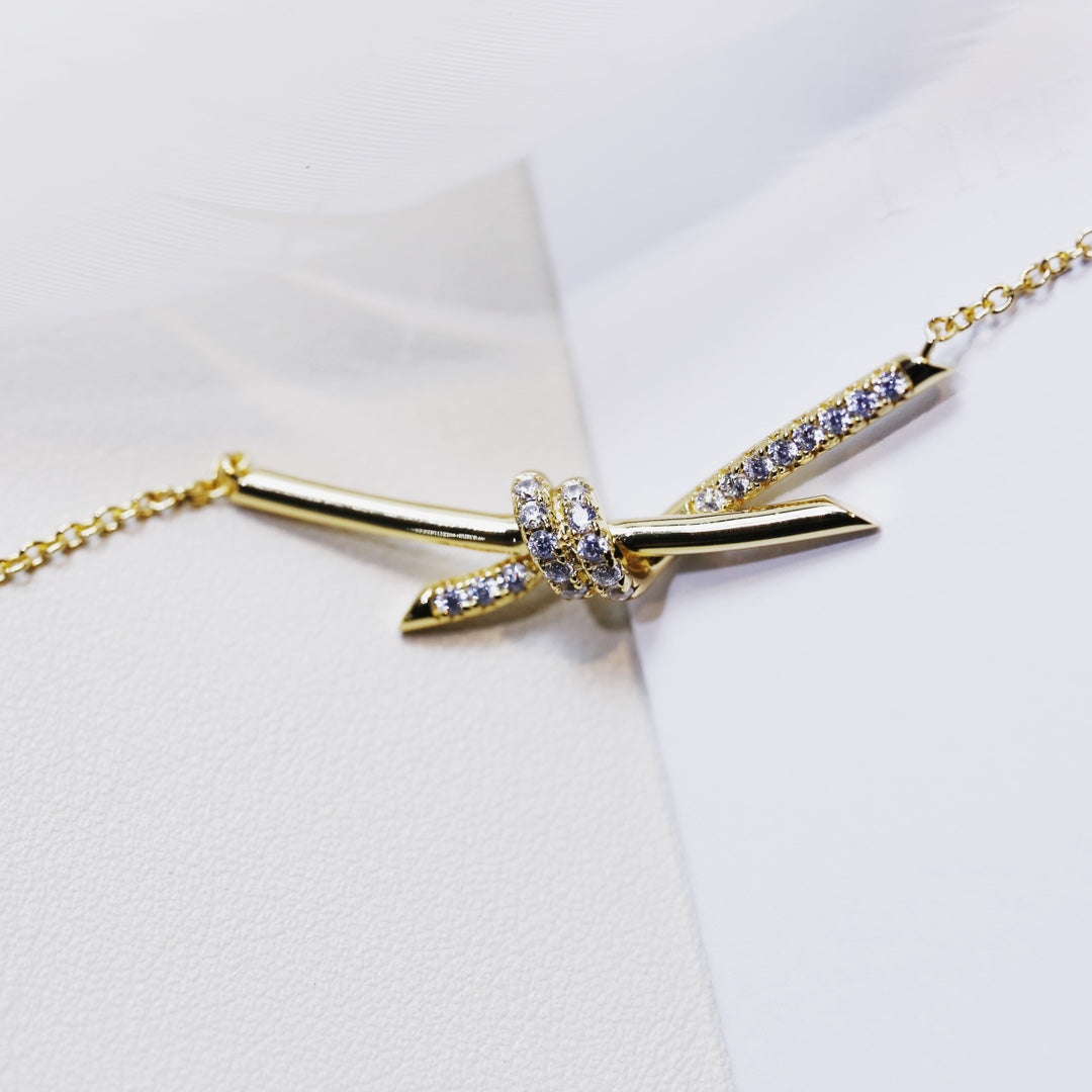 TIFFANY KNOT NECKLACE GOLD DIAMONDS