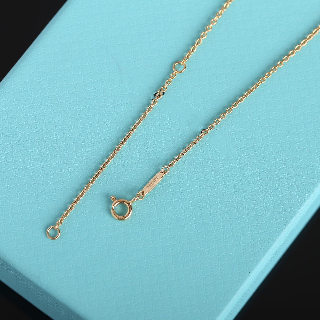 TIFFANY KNOT NECKLACE GOLD