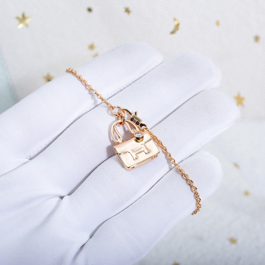 HERMES AMULETTE CONSTANCE PEDANT PINK GOLD NECKLACE