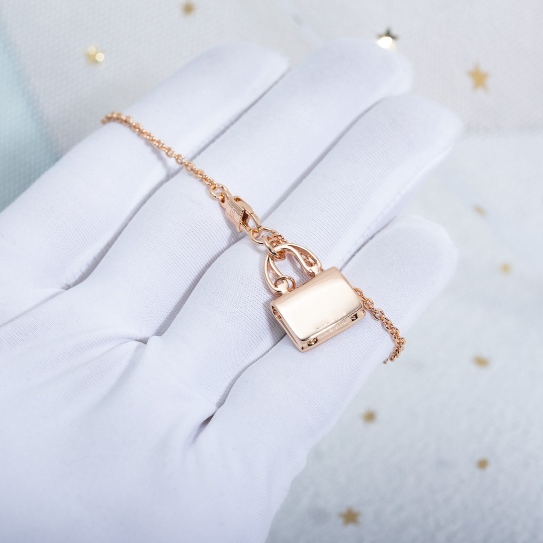 HERMES AMULETTE PEDANT PINK GOLD NECKLACE