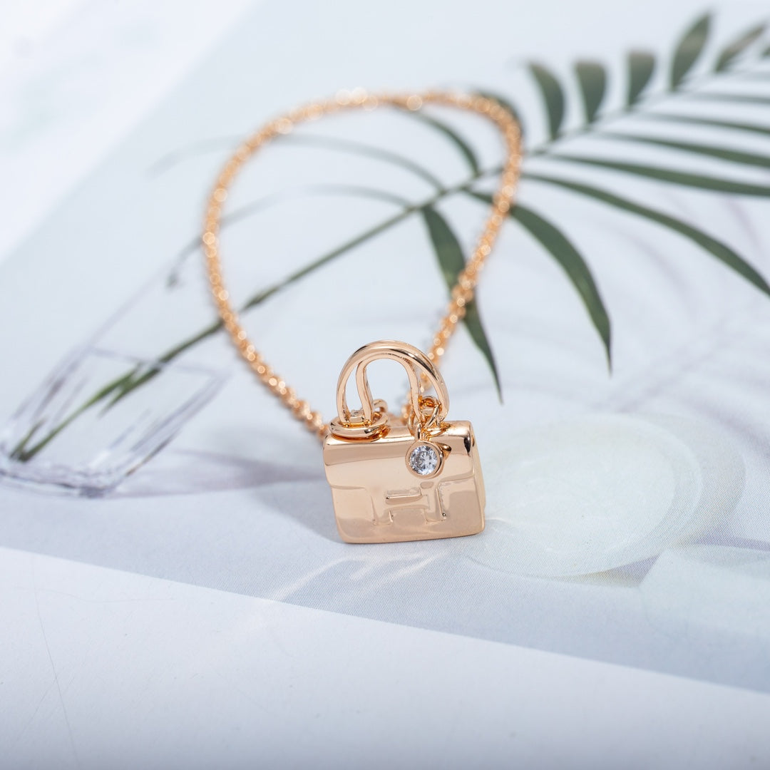 HERMES AMULETTE CONSTANCE PEDANT PINK GOLD NECKLACE