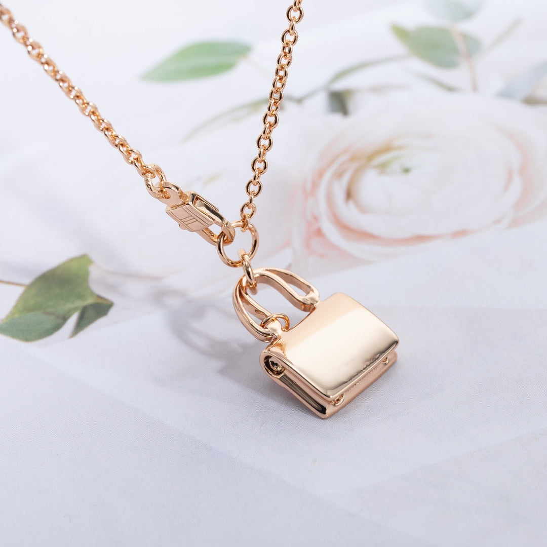 HERMES AMULETTE PEDANT PINK GOLD NECKLACE