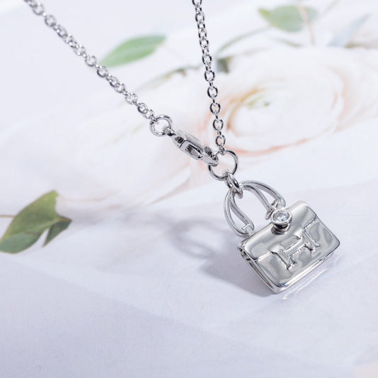 HERMES AMULETTE CONSTANCE PEDANT SILVER NECKLACE
