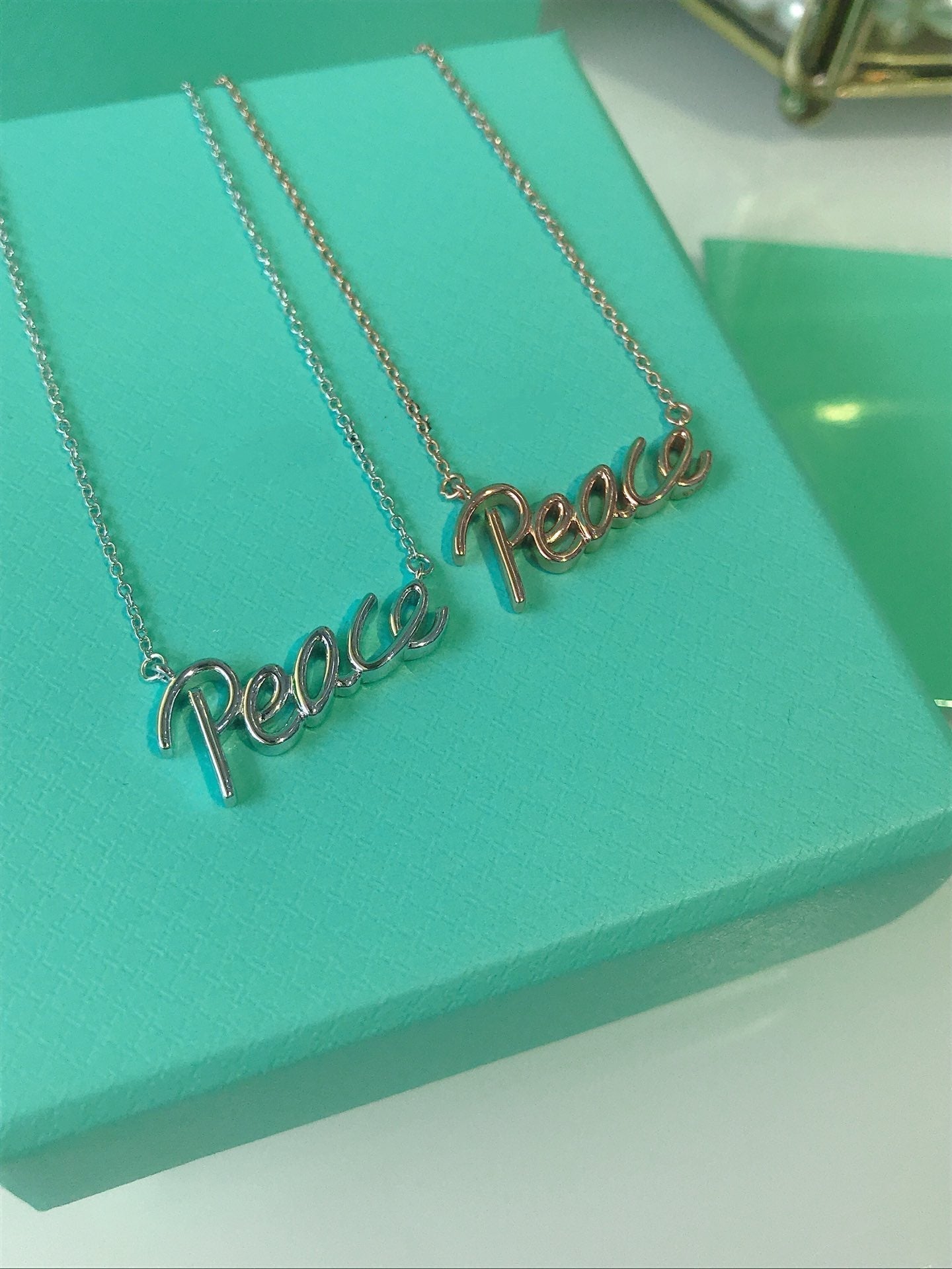 TIFFANY PEACE TEXT PEDANT NECKLACE