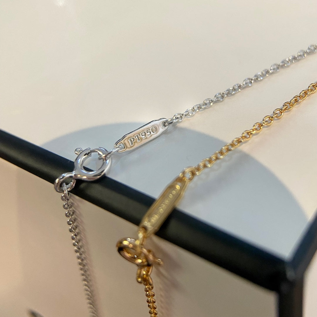 TIFFANY PETAL KEY PEDANT