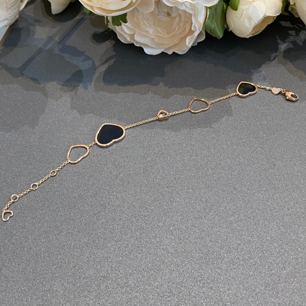CHOPARD HAPPY HEART ONYX PINK GOLD BRACELET