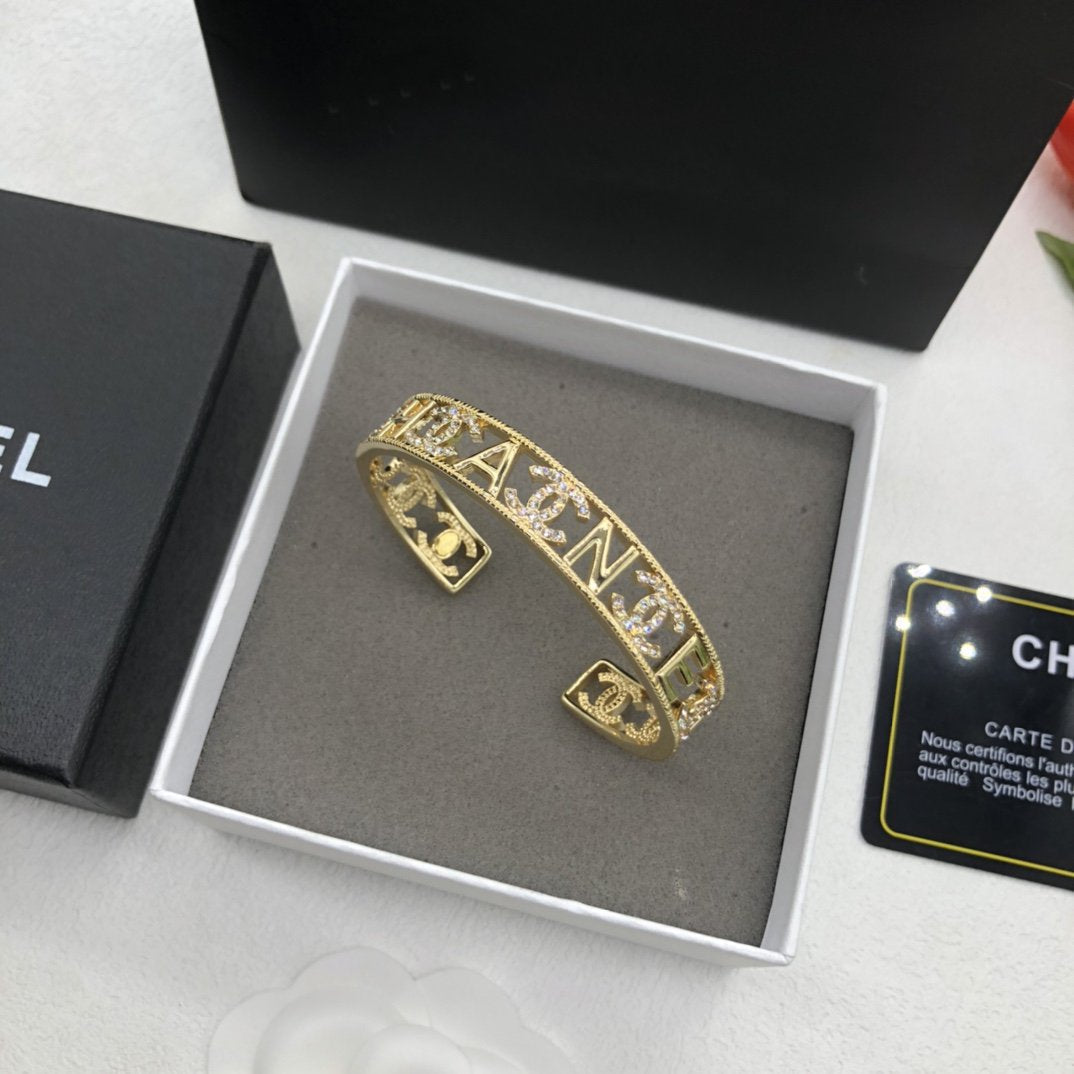 Chanel Logo Cuff Gold Bracelet