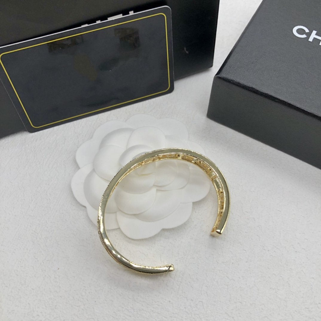 Chanel Logo Cuff Gold Bracelet