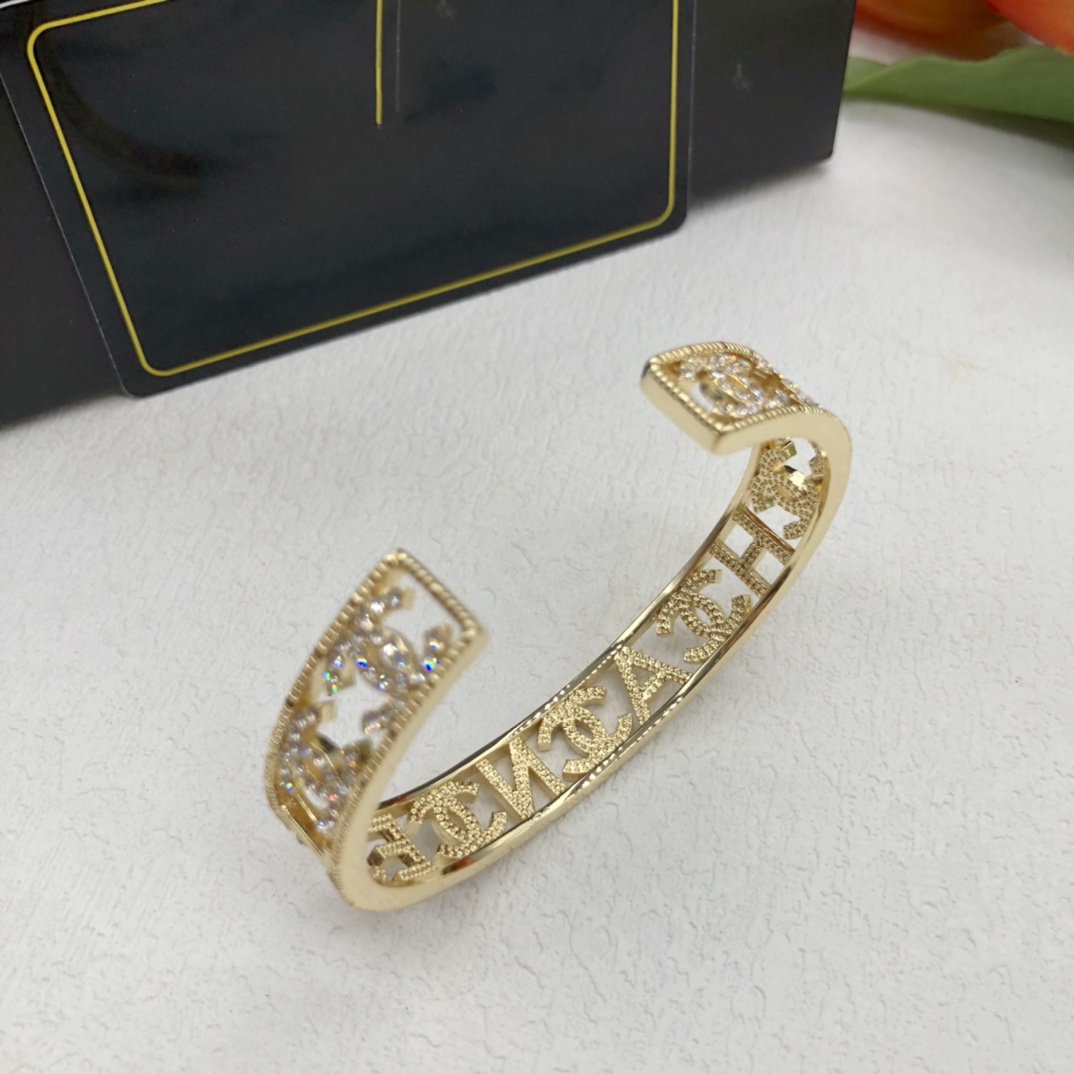 Chanel Logo Cuff Gold Bracelet