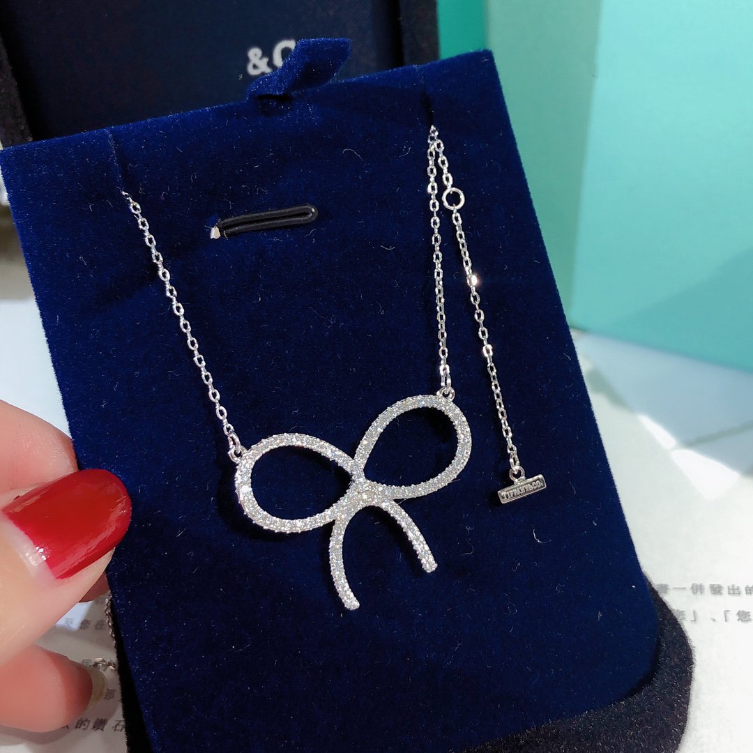 TIFFANY CLAW SET RHODIUM PLATED BOW NECKLACE