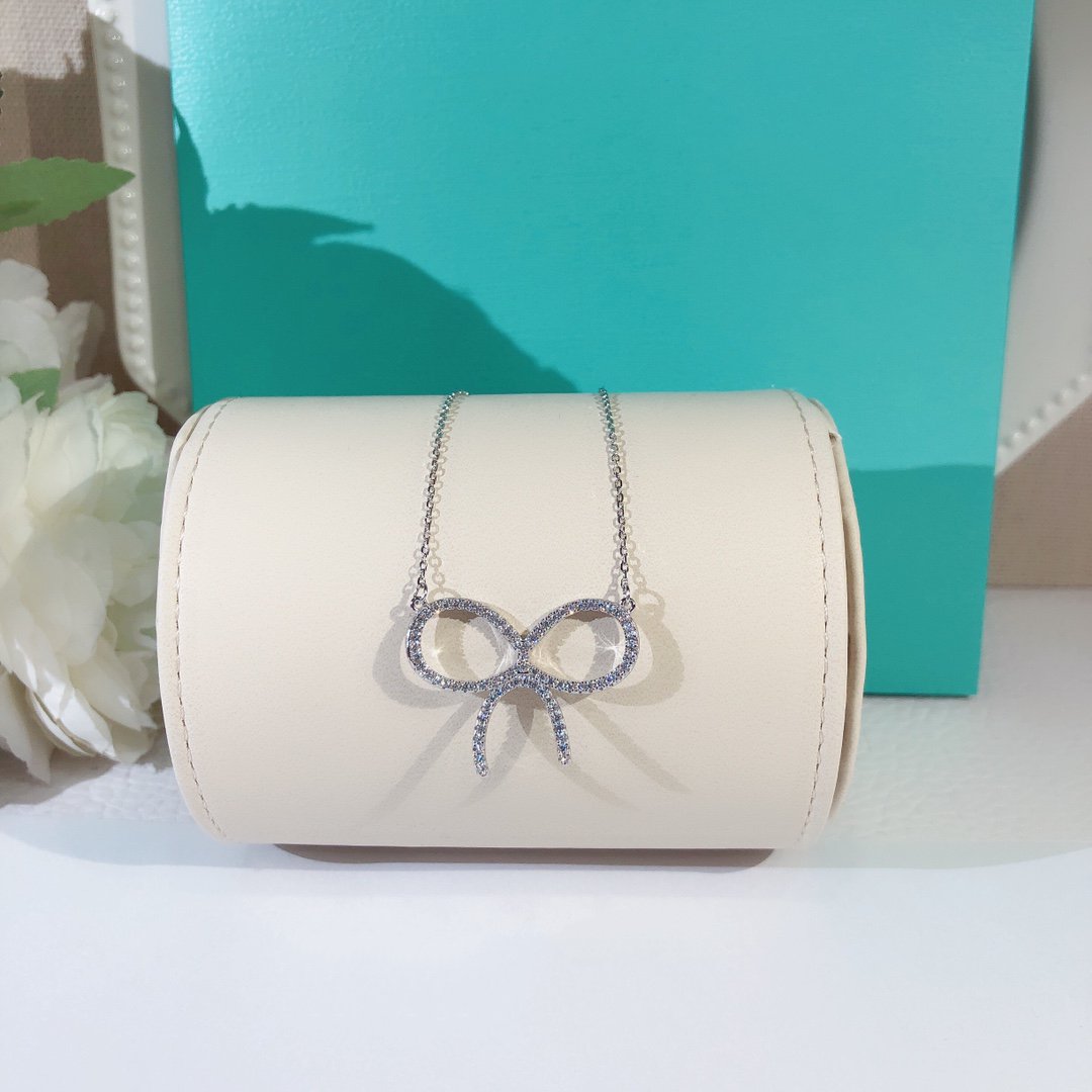 TIFFANY CLAW SET RHODIUM PLATED BOW NECKLACE