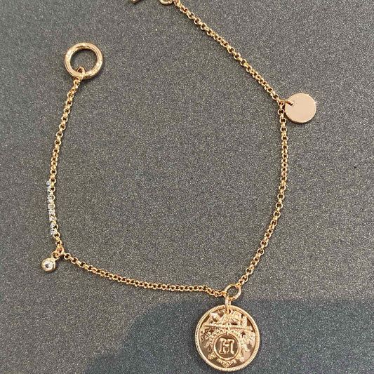 HERMES H Classic Gold Coin Bracelet