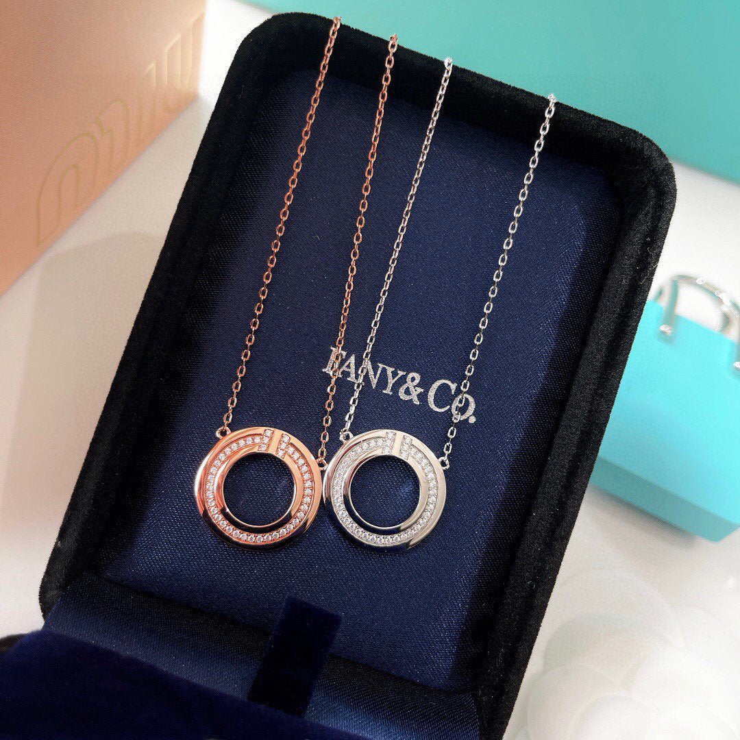 TIFFANY DIAMOND AND MOTHER OF PEARL CIRCLE PENDANT