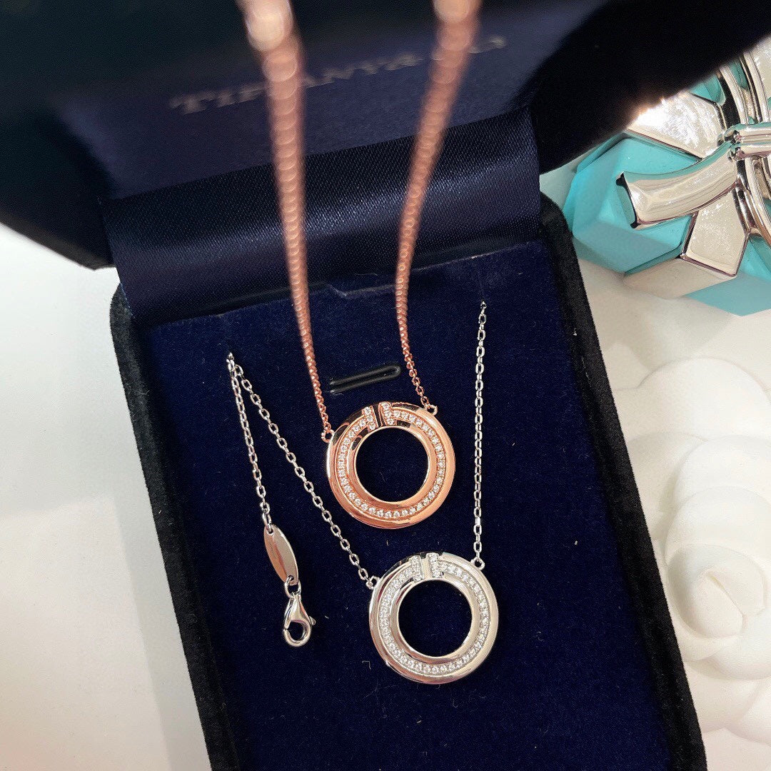 TIFFANY DIAMOND AND MOTHER OF PEARL CIRCLE PENDANT
