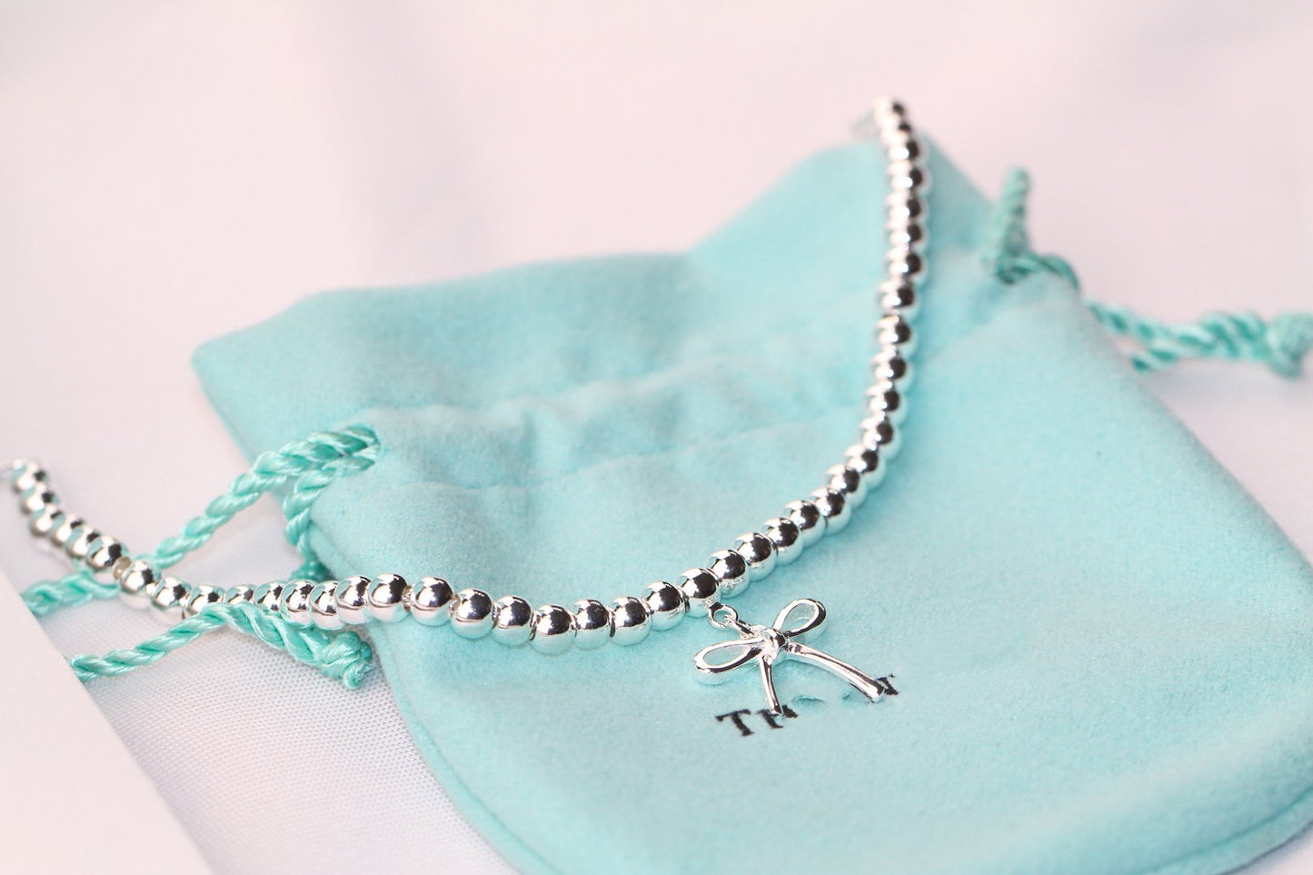 TIFFANY STERLING SILVER BOW BEAD BRACELET