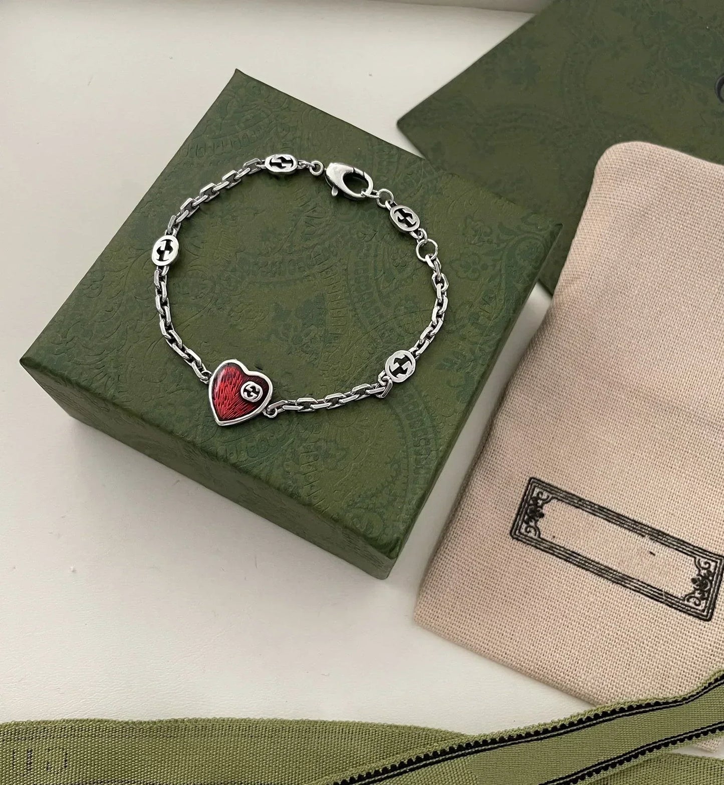 GUCCI GG HEART AGED FINISH STERLING SILVER RED ENAMEL BRACELET