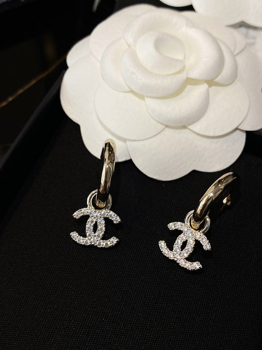 Chanel Double C Gold Diamond Earrings
