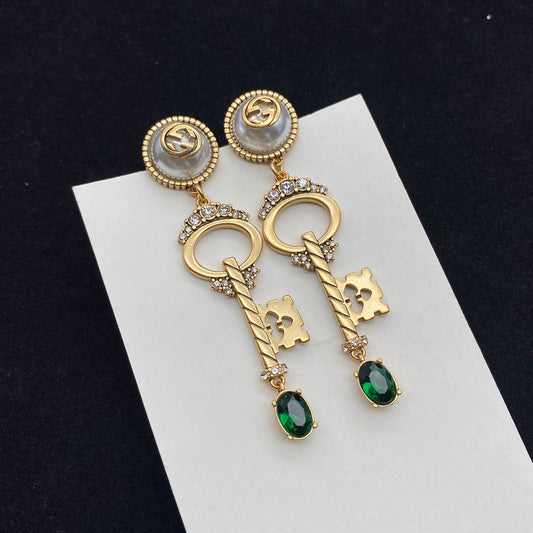 GUCCI KEY SHAPED DANGLE GG EARRING