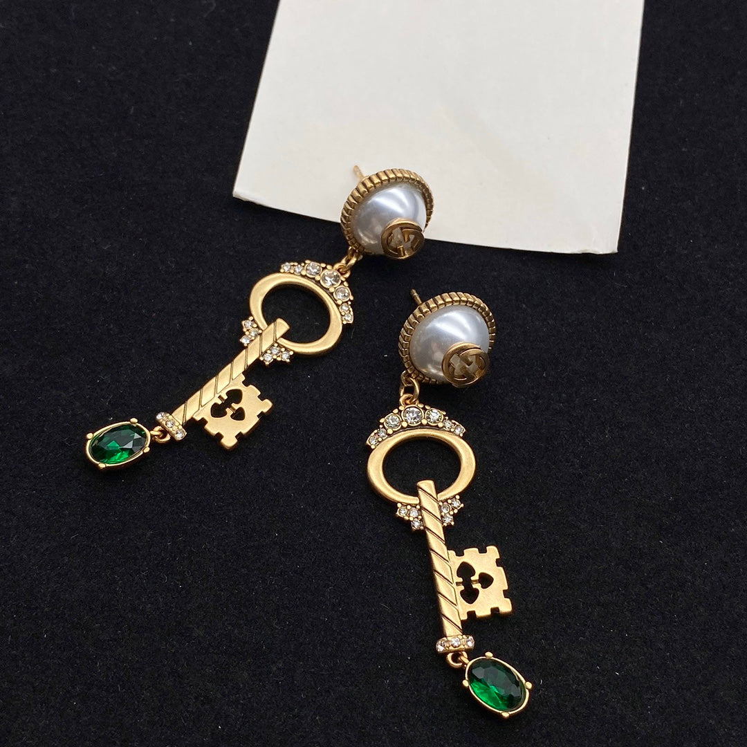 GUCCI KEY SHAPED DANGLE GG EARRING