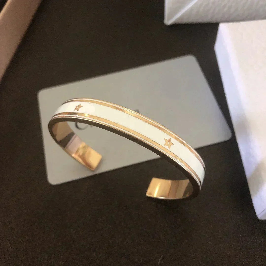 DIOR CODE BANGLE GOLD-FINISH METAL AND LACQUER WOMEN