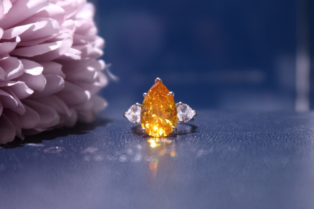 GRAFF PROMISE PEAR SHAPE YELLOW SILVER DIAMOND RING