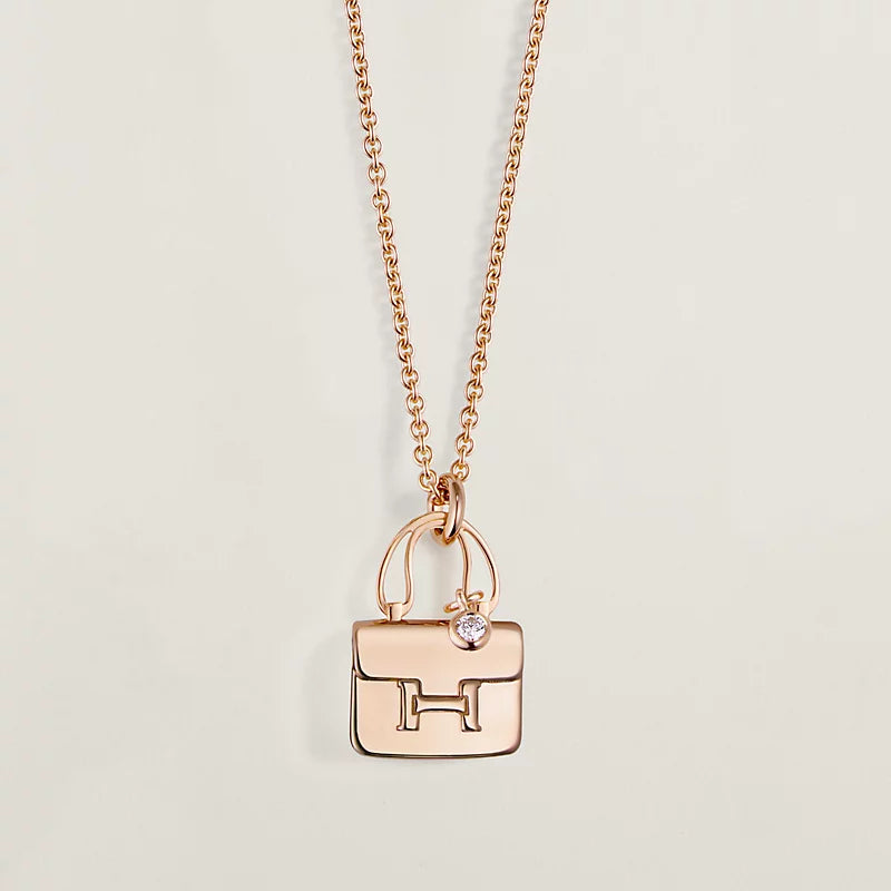 HERMES AMULETTE CONSTANCE PEDANT PINK GOLD NECKLACE