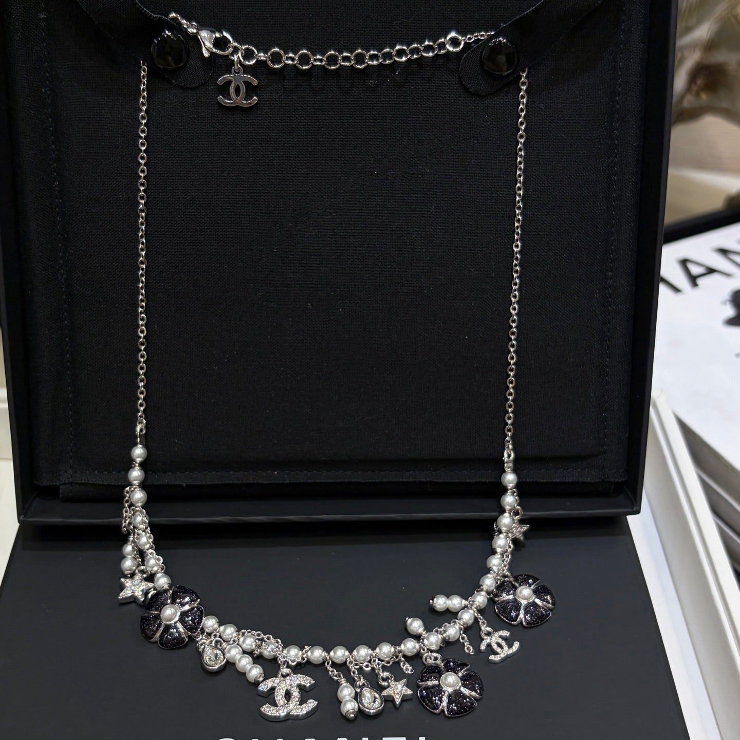 Chanel 2026 Silver Double C Black Flower Pearl Tassel Necklace