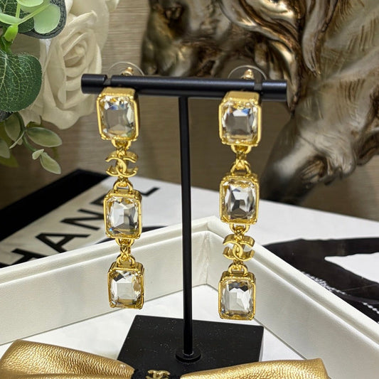 Chanel 2026 Gold Double C Transparent Rock Candy Long Stud Earrings