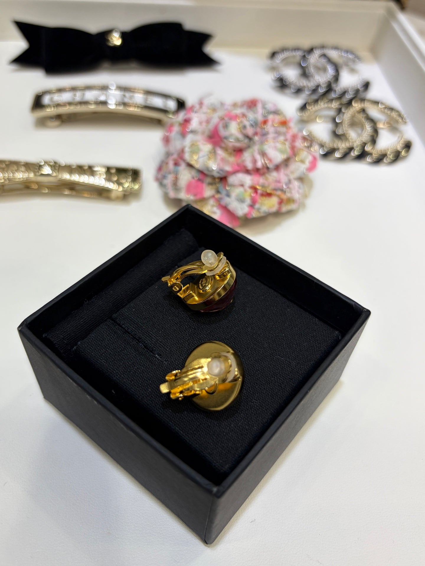 Chanel Gripoix Earrings With Gold Chanel Logo And Red Glass Stones