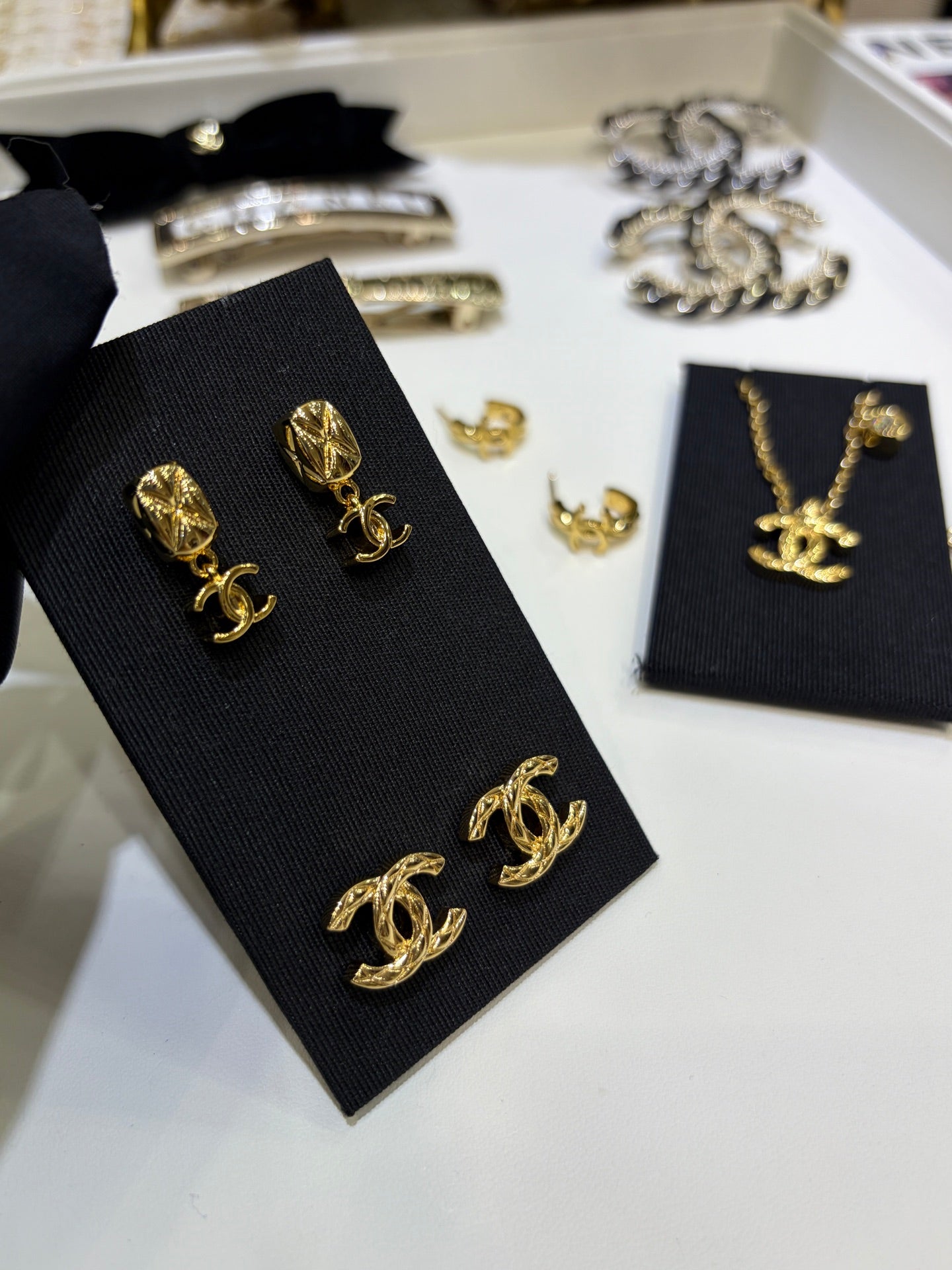 Chanel 2026 Gold Diamond Pattern Small Square Double C Pendant Earrings