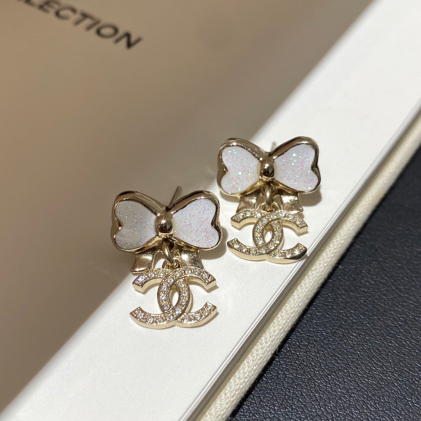 Chanel Fine Sparkling Bow Gold Mop Earrings