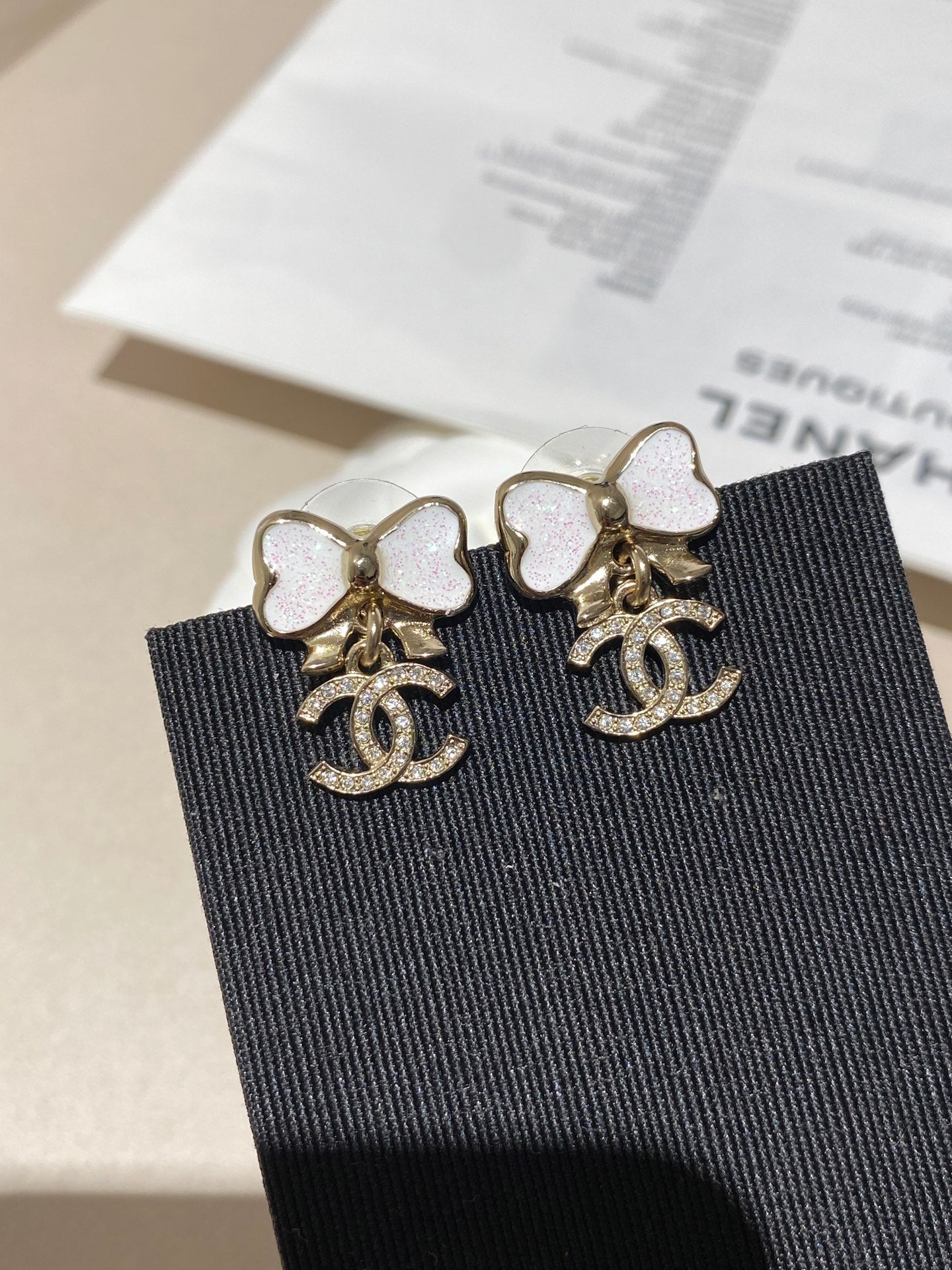 Chanel Fine Sparkling Bow Gold Mop Earrings