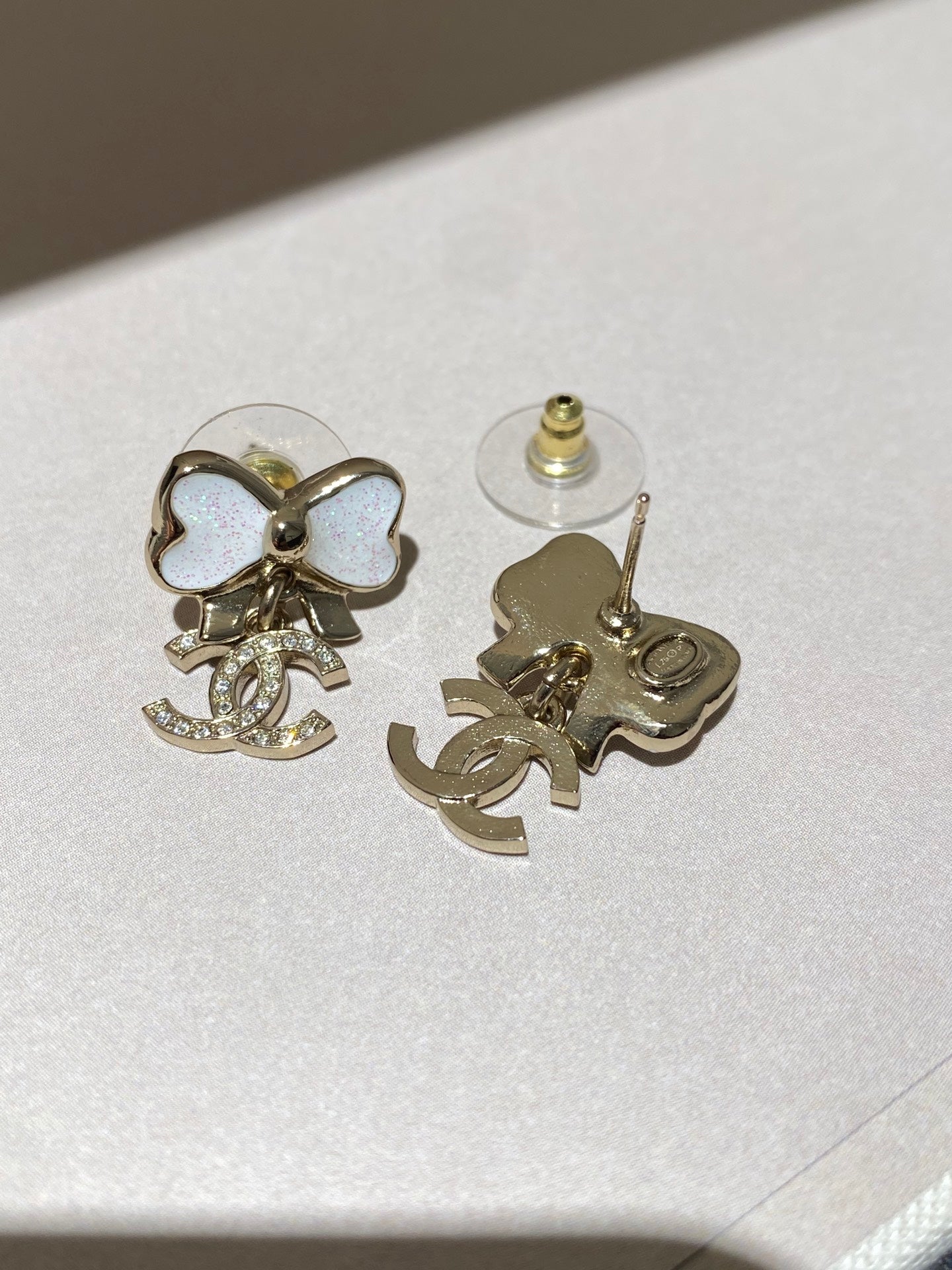 Chanel Fine Sparkling Bow Gold Mop Earrings