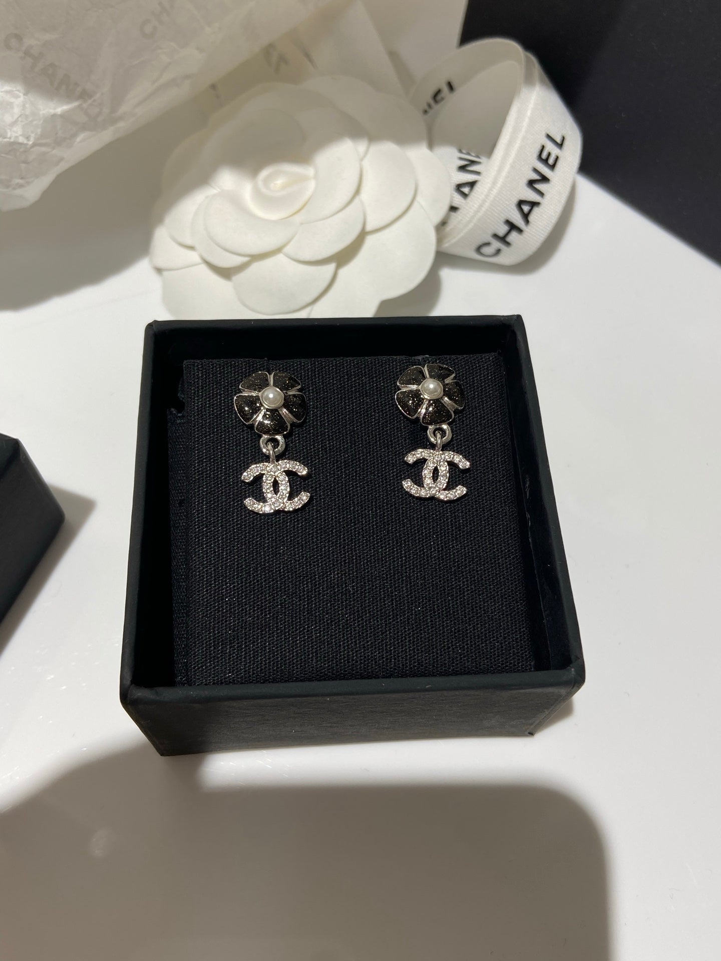 Chanel Flower Pendant Silver Black Diamond Earrings