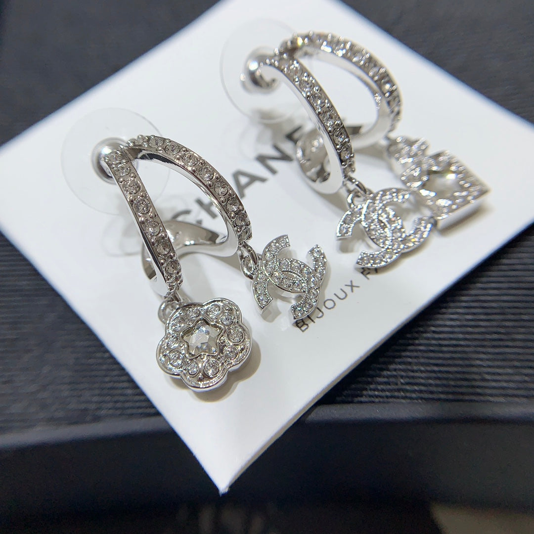 Chanel Silver Asymmetrical Earrings