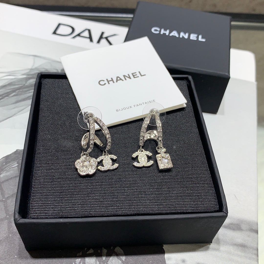 Chanel Silver Asymmetrical Earrings