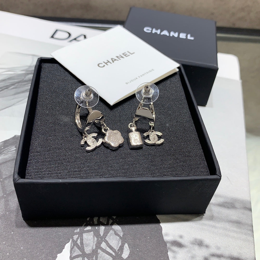 Chanel Silver Asymmetrical Earrings