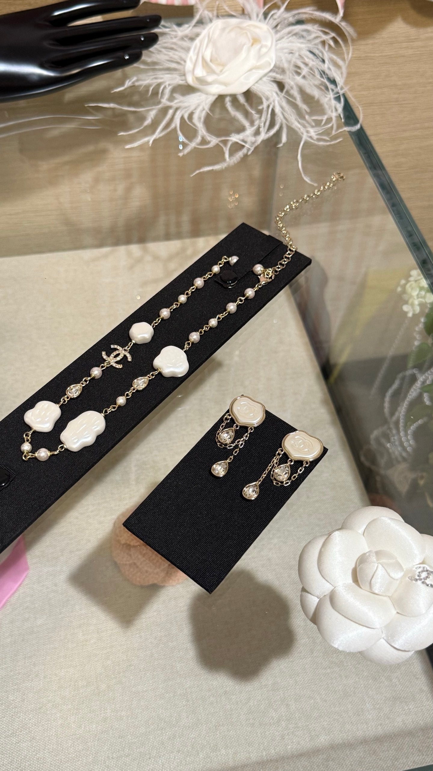 Chanel Cloud Double C Resin Double Teardrop Crystal Light Gold Chain Tassel Earrings