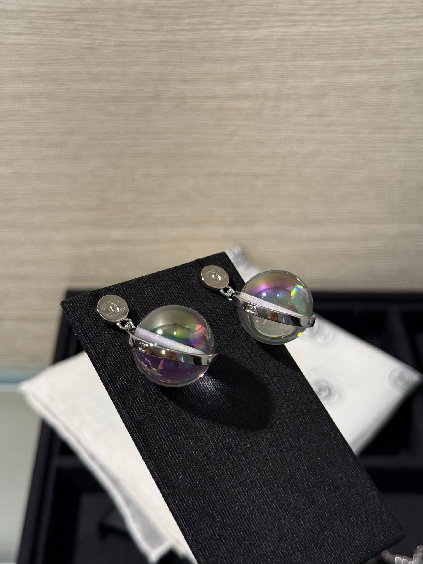 Chanel 2026 Transparent Iridescent Crystal Ball Planet Silver Button Double C Earrings