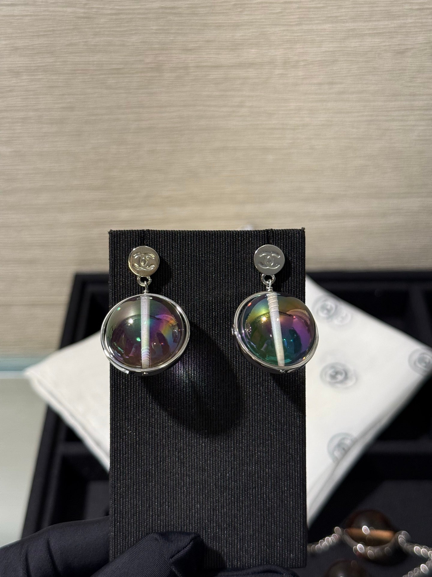 Chanel 2026 Transparent Iridescent Crystal Ball Planet Silver Button Double C Earrings