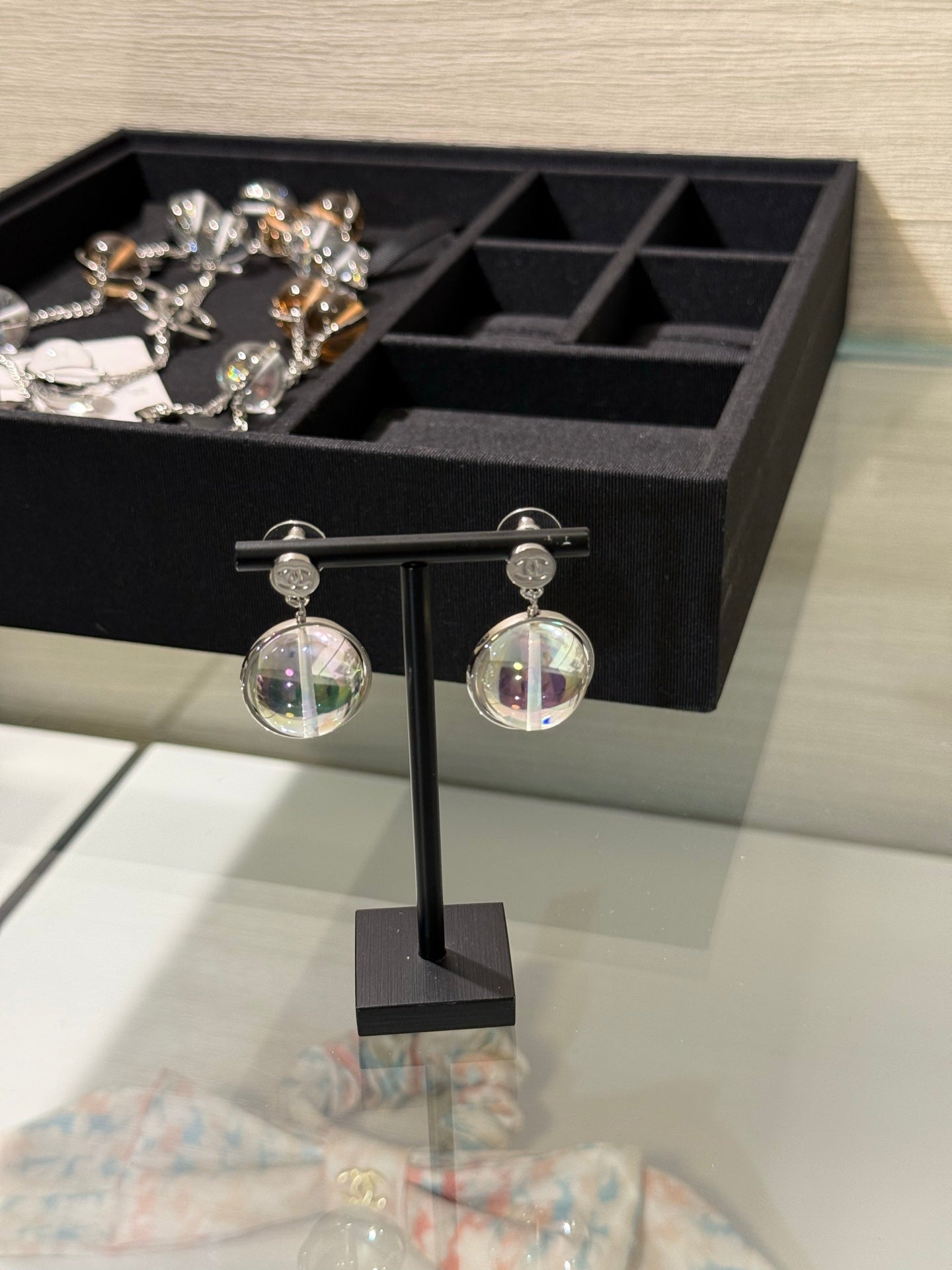 Chanel 2026 Transparent Iridescent Crystal Ball Planet Silver Button Double C Earrings