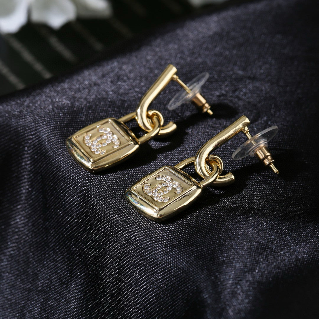Chanel Lock Shaped Gold Diamond Earring