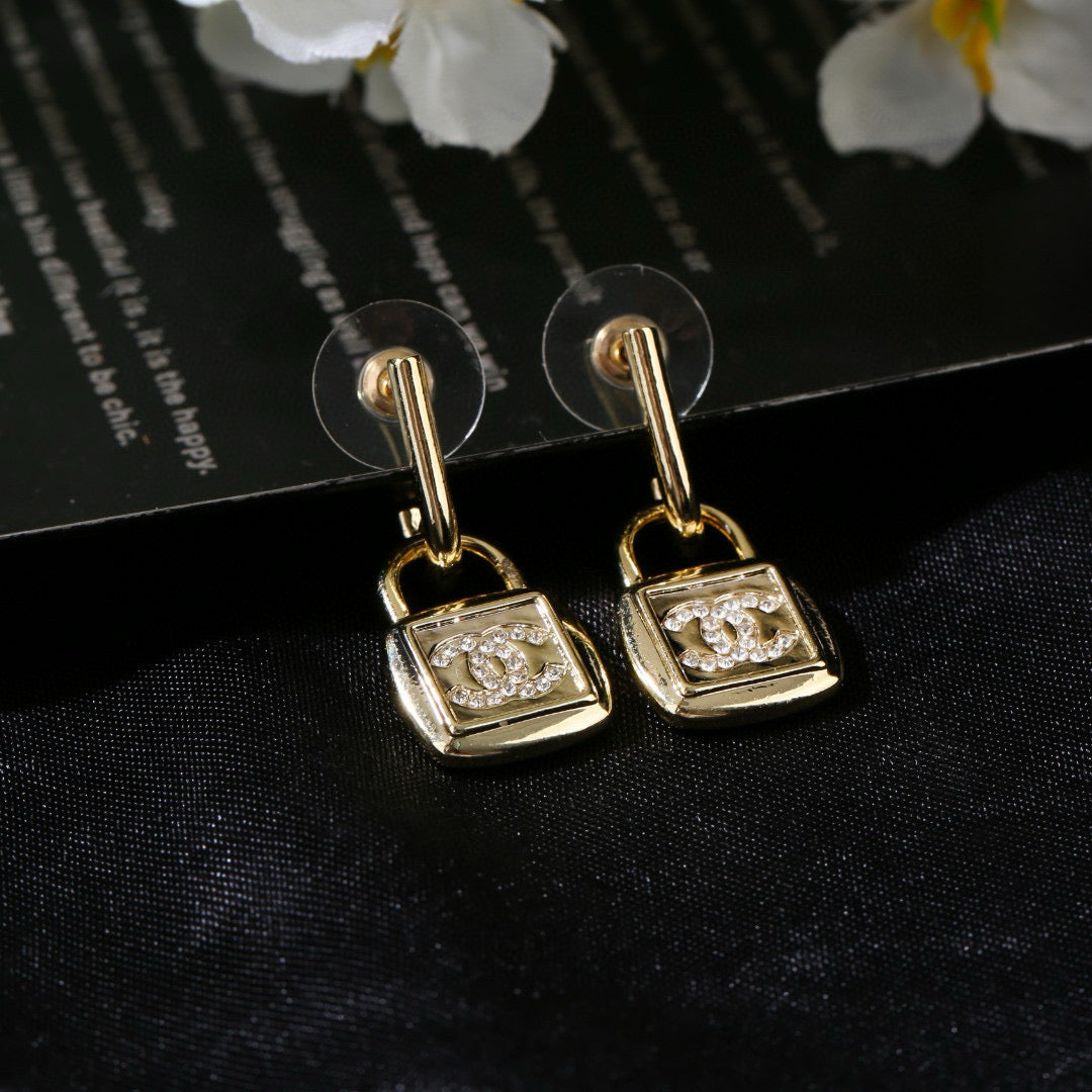 Chanel Lock Shaped Gold Diamond Earring