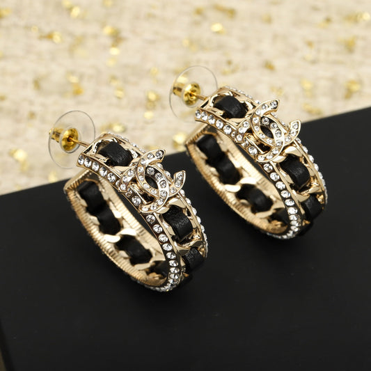 Chanel Double C Gold Leather Curved Hook Stud Earrings